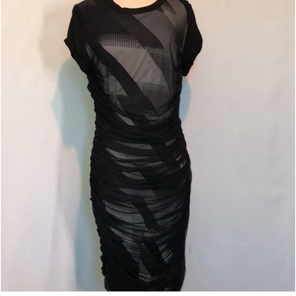 BCBG Ribbed bodycon dress with layered tulle by bcbgmaxazria. Worn twice.